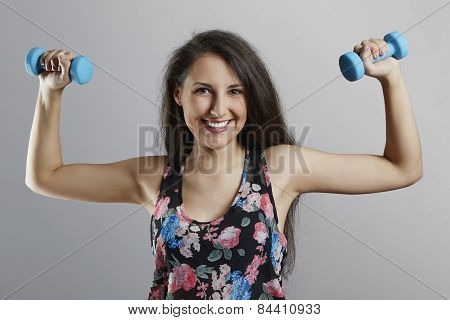 Cheerful fit woman exercising