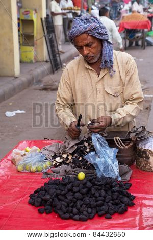 Delhi, India - November 5: Unidentified Man Sells Fruits From A Stall On November 5, 2014 In Delhi,