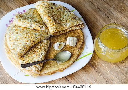 pancakes with butter and honey