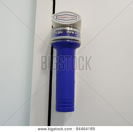 Emergency Flashlight On The Wall