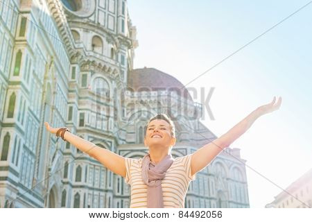 Young Woman Standing In Front Of Cattedrale Di Santa Maria Del F