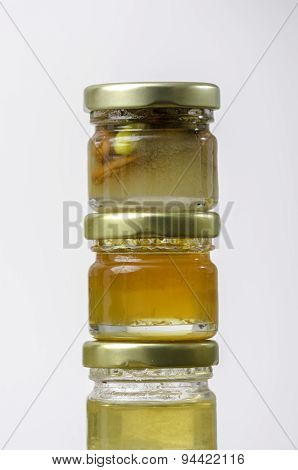 Three Jars Of Honey Of Differents Flavors