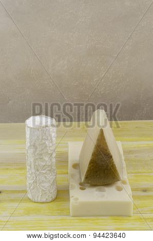 Spanish Manchego Cheese, Goat Cheese And Gruyere.