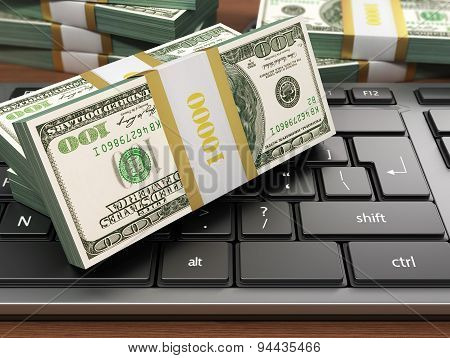 Us Hundred Dollar Bills On White Modern Computer Keyboard. Dollars Stack.