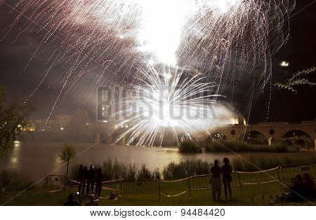 People Observing The Puente De Palmas Fireworks At San Juan Festivity Night