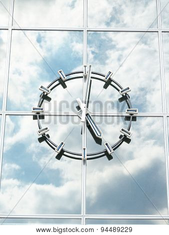 wall clock with sky reflection