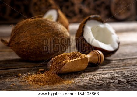 Coconut Palm Sugar On Rustic Wooden Background