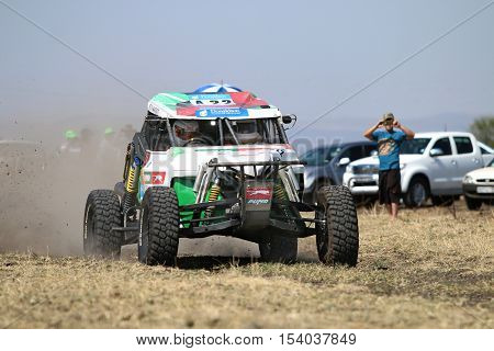Speeding White Bat Rally Car Front View