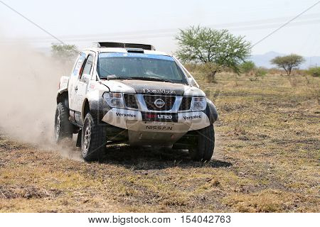 Front View Close-up Of Racing Black And White Nissan Navara Rally Car