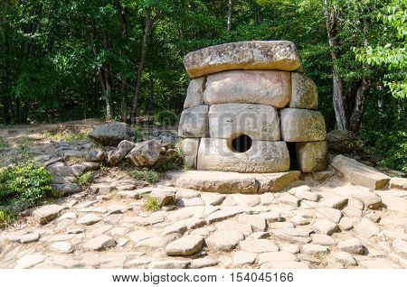 Dolmen single-chamber megalithic tomb of the Middle Bronze Age (3000-2000 BC). Valley of Zhane River near the village Vozrozhdenie in the vicinity of the resort city of Gelendzhik. Western Caucasus Krasnodar region of Russia.