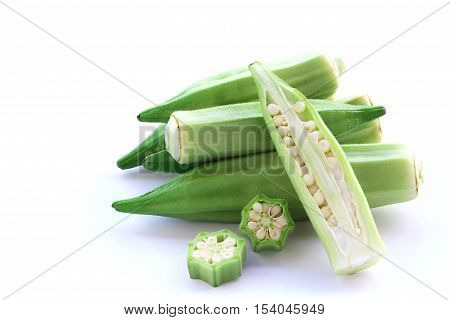 Close up fresh okra isolated on a white background