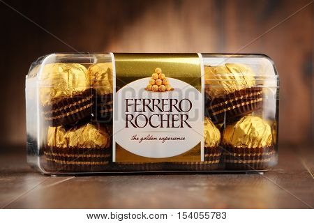 POZNAN POLAND - OCT 13 2016: Ferrero Rocher premium chocolate sweets produced by the Italian chocolatier Ferrero SpA. are sold in over 40 countries in amount of about 3.6 billion a year