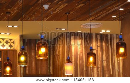 A group of hanging lamps under the ceiling