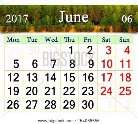 calendar for June 2017 on the background of summer landscape with mountain slove and pines