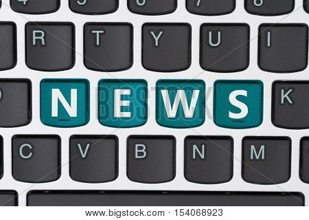 Getting your news online A close-up of a keyboard with teal highlighted text News