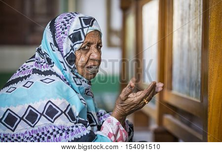 Sudanese Woman Praying