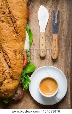 Espresso And Bun With Ham For Breakfast