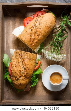 Nice Breakfast With Coffee, Sandwich And Flowers