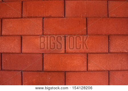 Background wall of bricks orange as well.