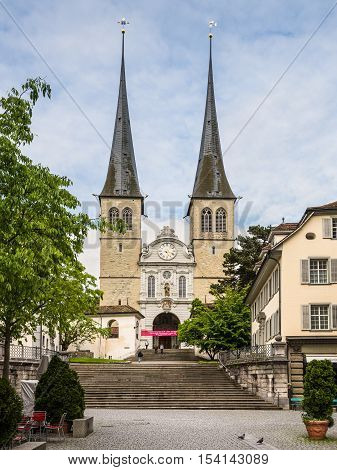 Lucerne Switzerland - May 24 2016: Church of St. Leodegar (also known as St. Leger Cathedral) the most important church and landmark in the city of Lucerne Switzerland.