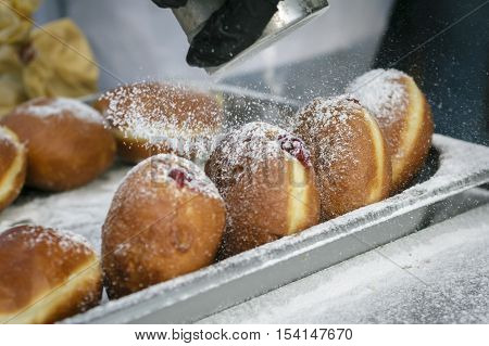 Preparation Of Donuts. The Filling And Powdered Sugar