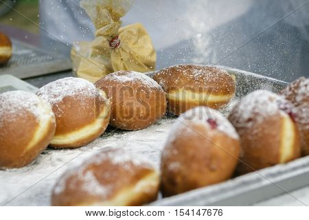 Preparation Of Donuts. The Filling And Powdered Sugar