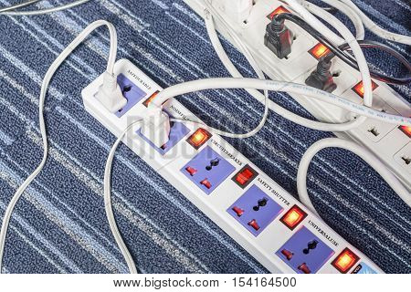 close up extension power strip on office floor