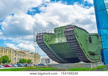 KHARKOV UKRAINE - MAY 20 2016: The monument of the First World War - the old British Tank Mark V is the favorite children's attraction in the city center on May 20 in Kharkov.