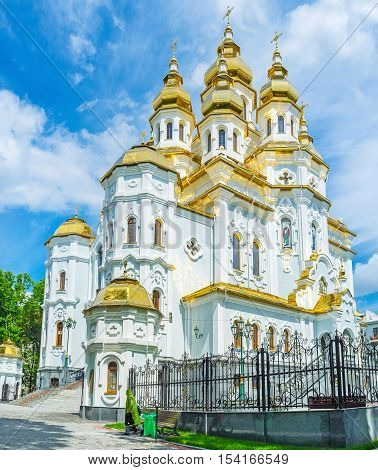 The Church of the Holy Myrrh-Bearers in Victory Square boasts bright golden domes and relief decors Kharkov Ukraine.