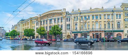 KHARKOV UKRAINE - MAY 20 2016: The historic mansions in the Konstitutsii Square with the Puppet Theater building decorated with mosaic pictures on May 20 in Kharkov.