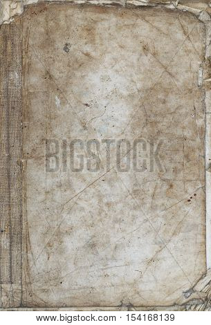 Detail of the old tattered book on white background