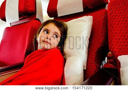 Little Girl In A Plane Scared To Fly -  Flying Phobia