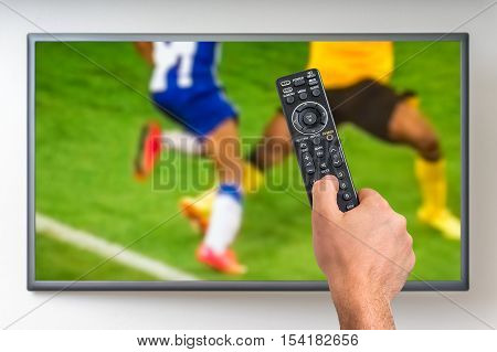 Man Is Watching Football Match On Tv
