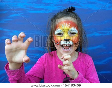 Little Child With Lion Face Painting