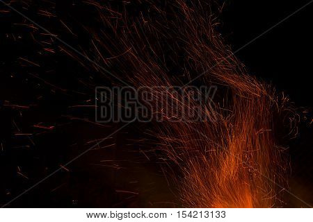 Fire flames on a black background. Blaze fire flame texture background. Close up of fire flames isolated on black background. Burn. Abstract fire flames background. Texture.