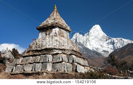 Stupa near Pangboche village with mount Ama Dablam - way to mount Everest base camp - Khumbu valley - Nepal