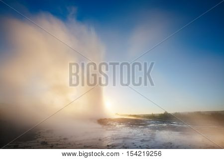 Great view of Strokkur geyser in morning light. Popular tourist attraction. Dramatic and gorgeous scene. Location place Geyser Park, Hvita river, Haukadalur valley area, Iceland. Europe. Beauty world.