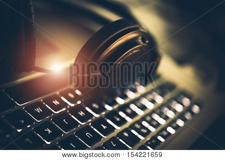 Audiophile Pro Headphones. High Quality Music Listening From Laptop Computer. Online Music Concept. Audiophile Computer Equipment