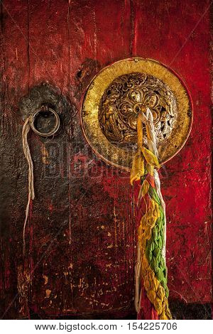 Decorated door handle of gates of Hemis gompa (Tibetan Buddhist monastery). Ladakh, India