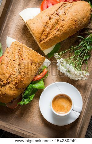 Nice Breakfast With Coffee, Sandwich And Flowers
