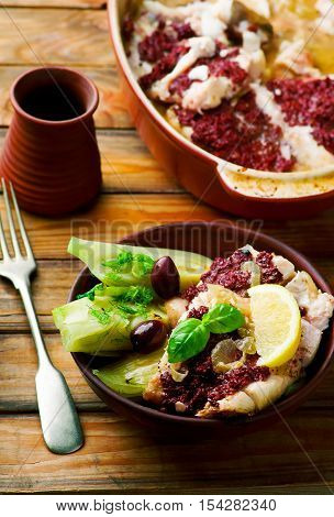 Cod with Olives and Fennel rustic style..seletive focus