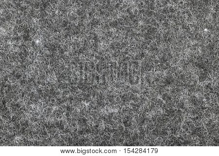 Grey felt wool fluffy texture background closeup