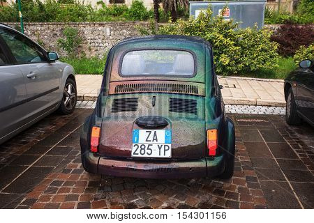 POLCENIGO ITALY - MAY 15: View of yellow Fiat Cinquecento retro Italian car on May 15 2016