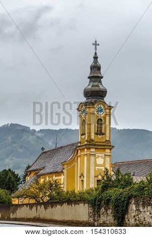 Yellow baroque church in Friesach Carinthia Austria