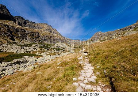 Beautiful Mlynicka dolina on the way to Bystre sedlo - in slovakian high Tatra mountains. Summer panorama with great weather and blue sky