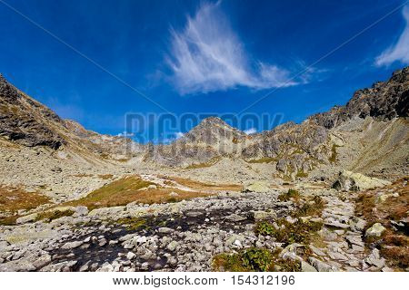 Beautiful Mlynicka dolina on the way to Bystre sedlo - in slovakian high Tatra mountains. Summer panorama with great weather and blue sky