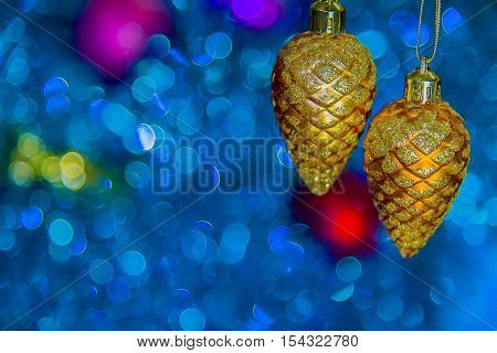 Christmas star closeup and baubles on blue blurred background Christmas toy on a blue background.