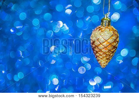 Christmas star closeup and baubles on blue blurred background Christmas toy on a blue background.