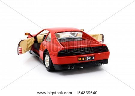 Model of red sports car on a white background closeup