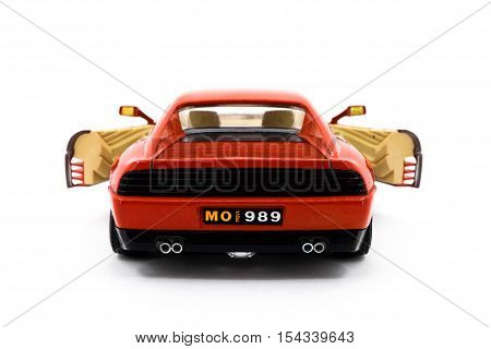 Model of red sports car on a white background closeup